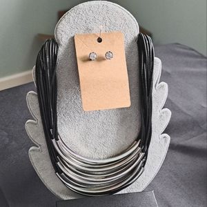 Tocara Jill necklace and earring set. Stainless steel. Wax cord.  20"+2"  New